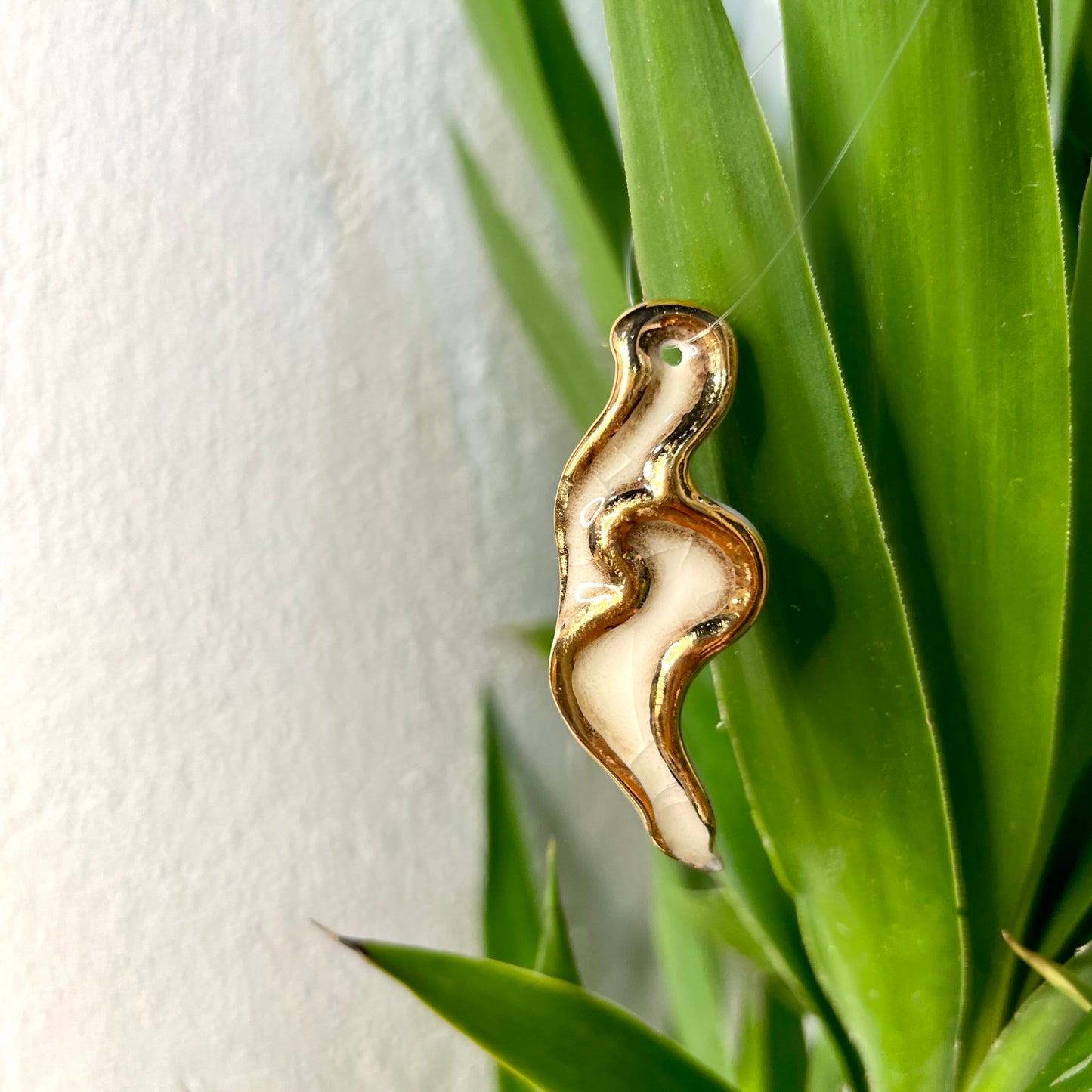 Plant Ornament 2 - Hand crafted Porcelain Home Ornament. Small Gold Flame design.