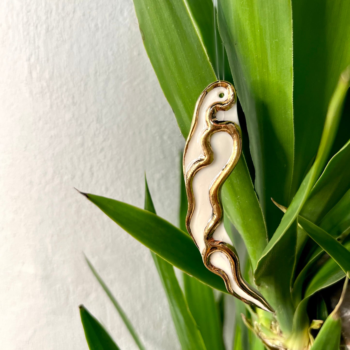 Plant Ornament 3 - Hand crafted Porcelain Home Ornament. Small Gold Flame design.