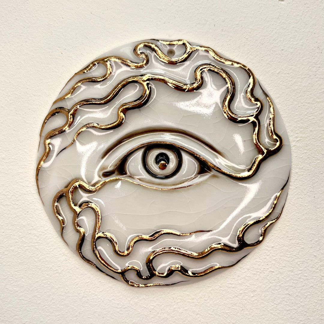 Tear Drop Wall Ornament 1 -  Hand crafted Porcelain Home Ornament. Circular ornament with Eye and flames.